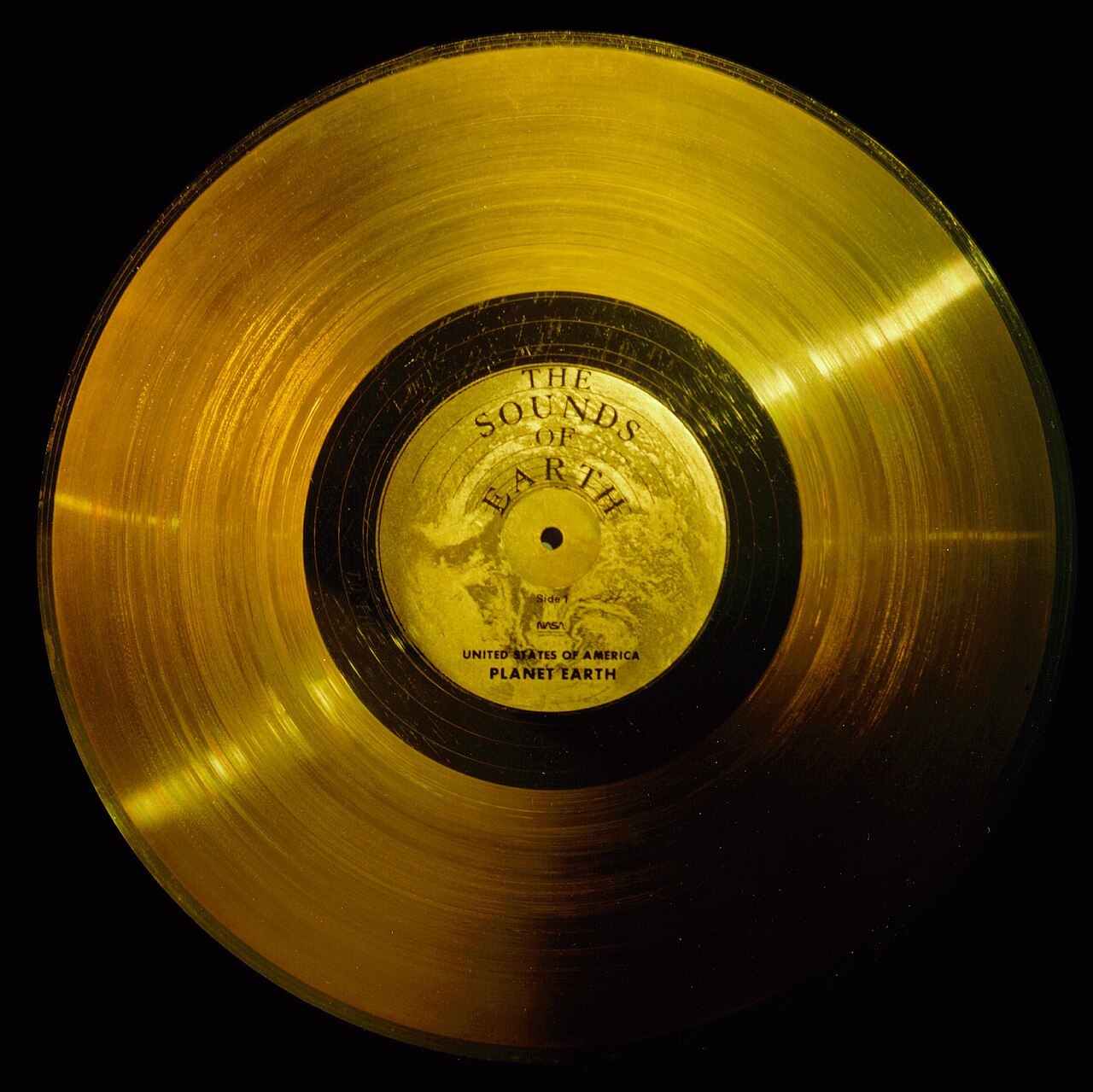The gold-plated Voyager record cover engraved with instructions for playing it