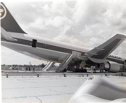 The Air Canada Boeing 767 resting nose-down on the runway at Gimli after its emergency landing