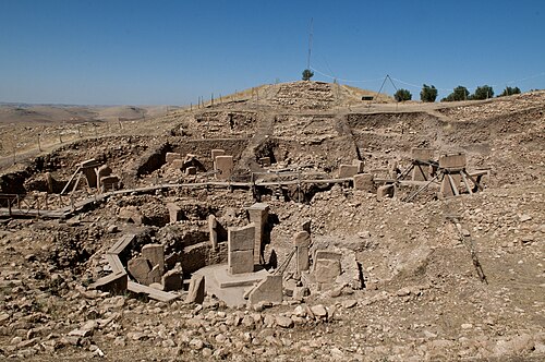 Carved T-shaped stone pillars in an excavated enclosure at Göbekli Tepe
